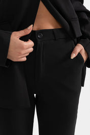 Calça Alfaiataria com Modelagem Levemente Evasê e Caimento Fluido