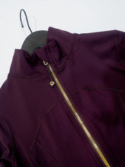 Conjunto Esportivo Feminino com Zíper Dourado e Calça Modeladora