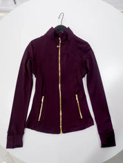 Conjunto Esportivo Feminino com Zíper Dourado e Calça Modeladora