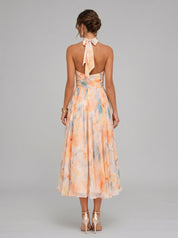 Renata | Vestido Midi Coral Floral com Decote Halter e Saia Plissada