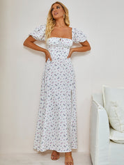 Marcelina | Vestido Midi Floral Azul com Manga Bufante e Fenda Alta
